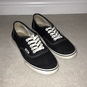 Black Vans.